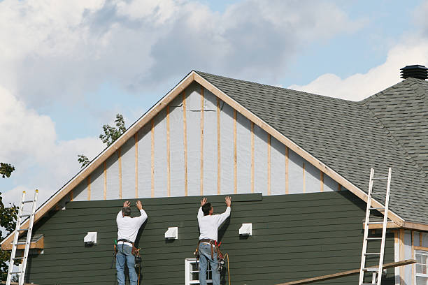 Professional Siding technician working in Burnham, PA